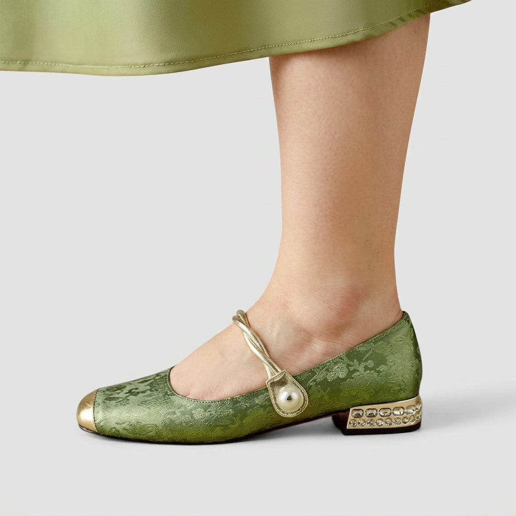 Woman wearing green square toe Mary Jane flats