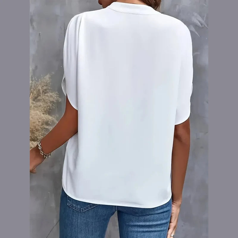Women's white V-neck blouse – back view