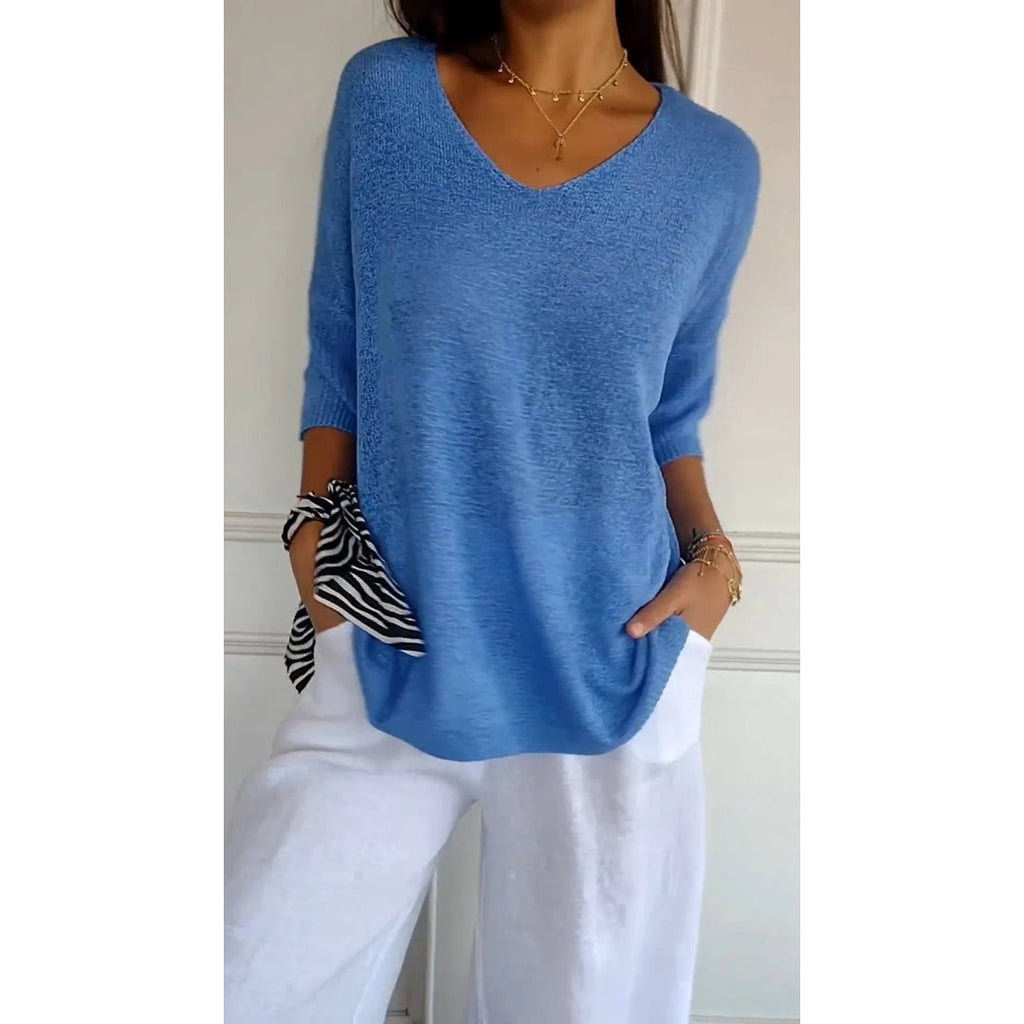 Women's blue V-neck knit tunic with short sleeves