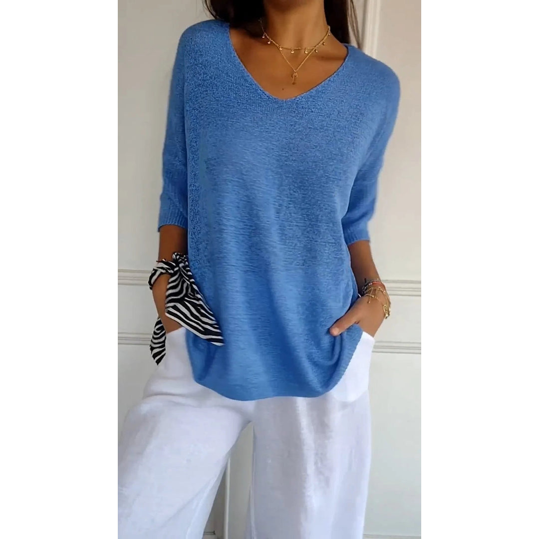 Women's blue V-neck knit tunic with short sleeves