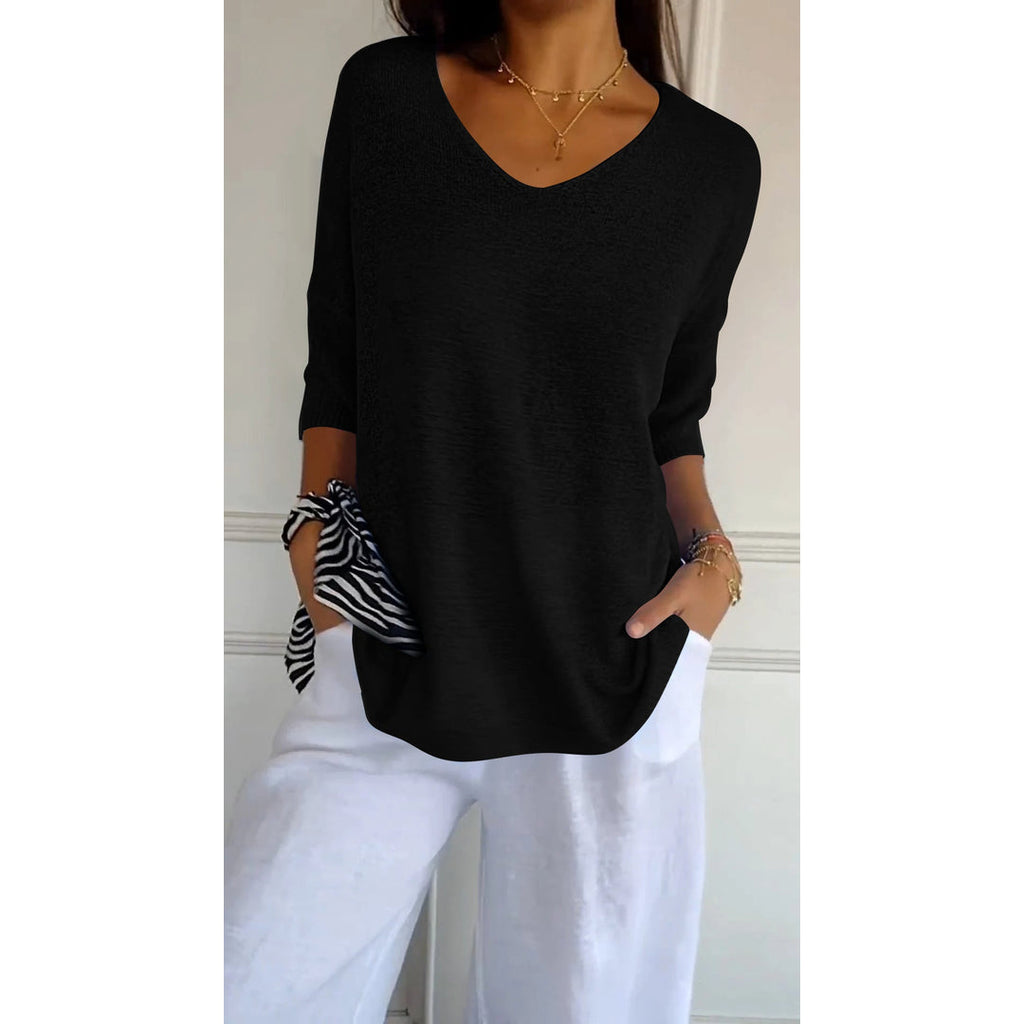 Women's black V-neck knit tunic