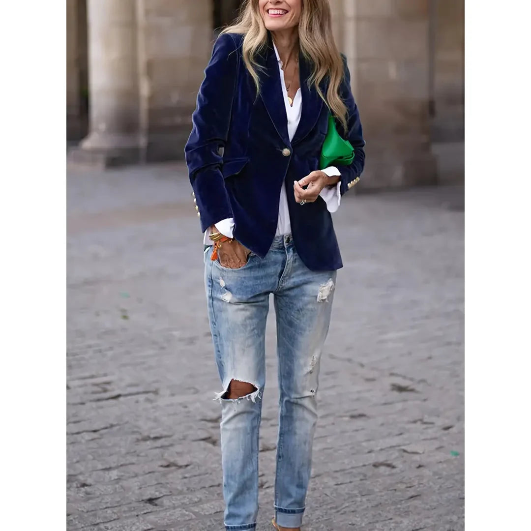 Woman wearing a blue velvet-look blazer