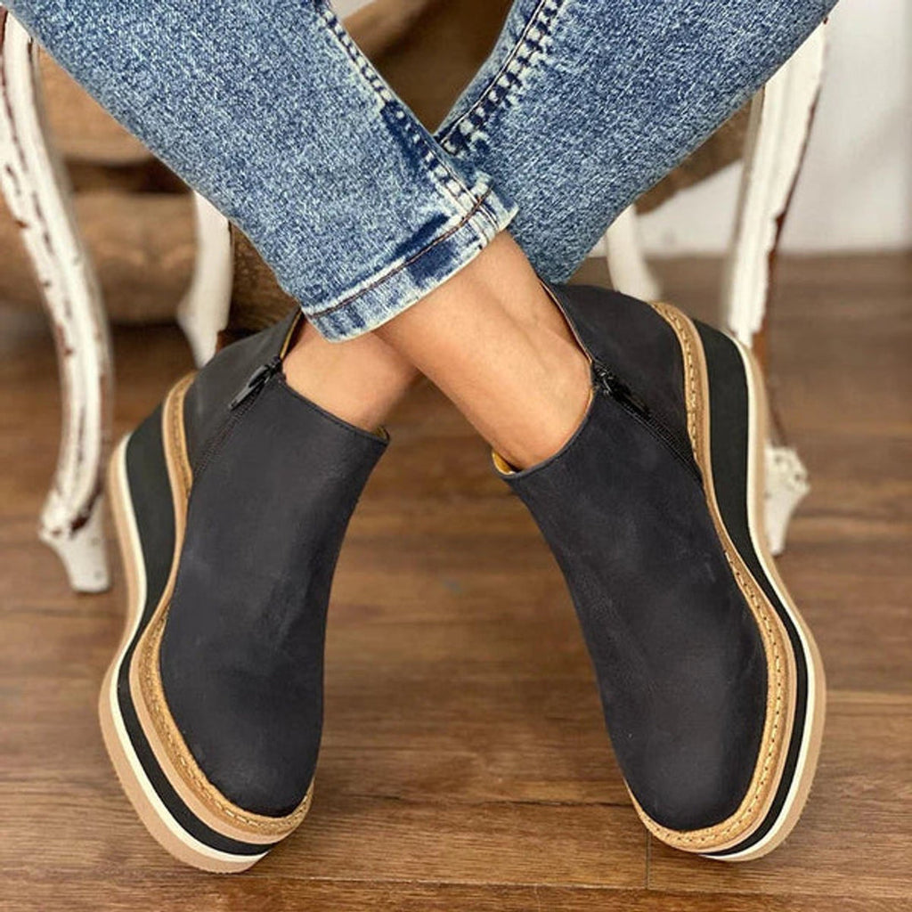 Black platform ankle boots with side zip