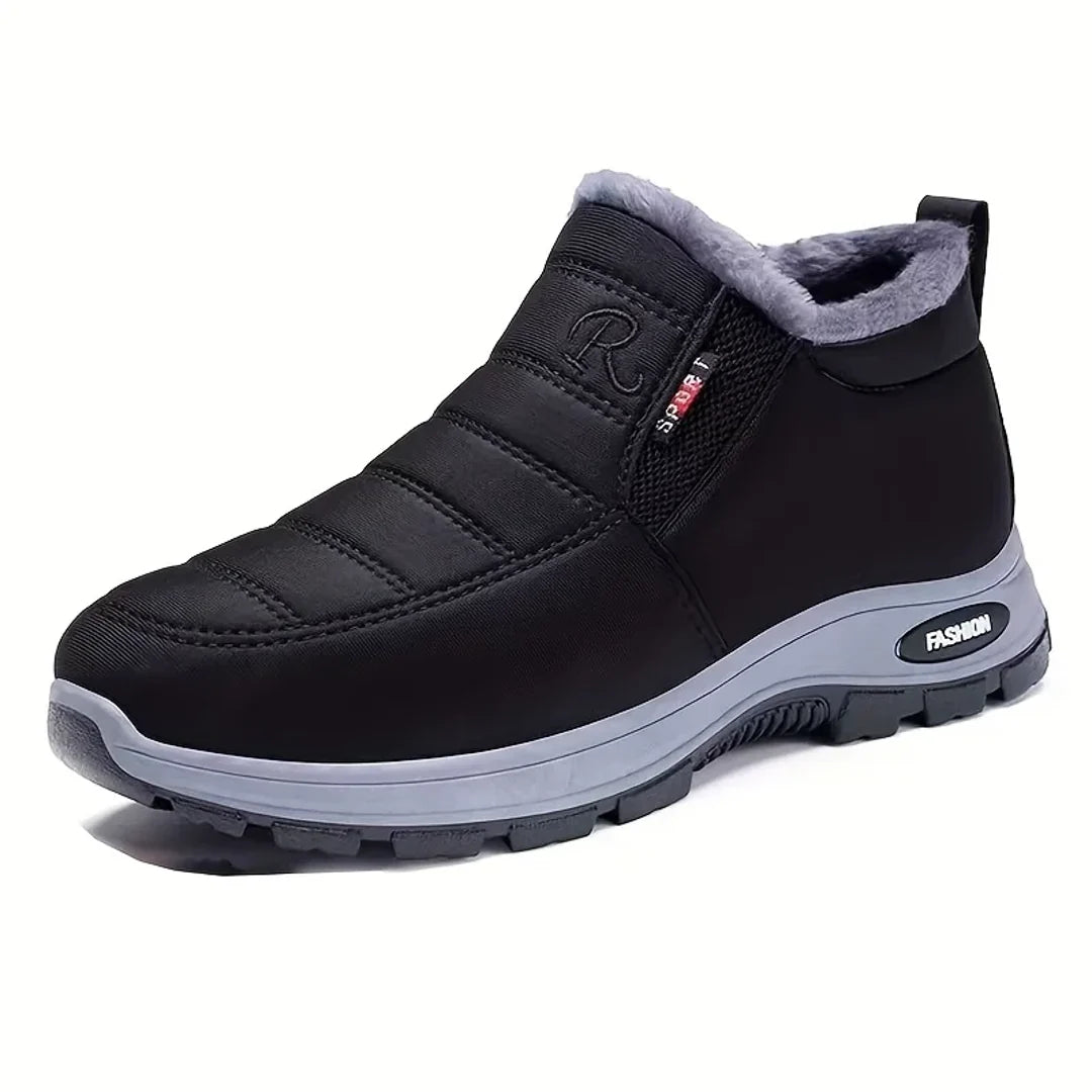 Women's black winter boot – studio view