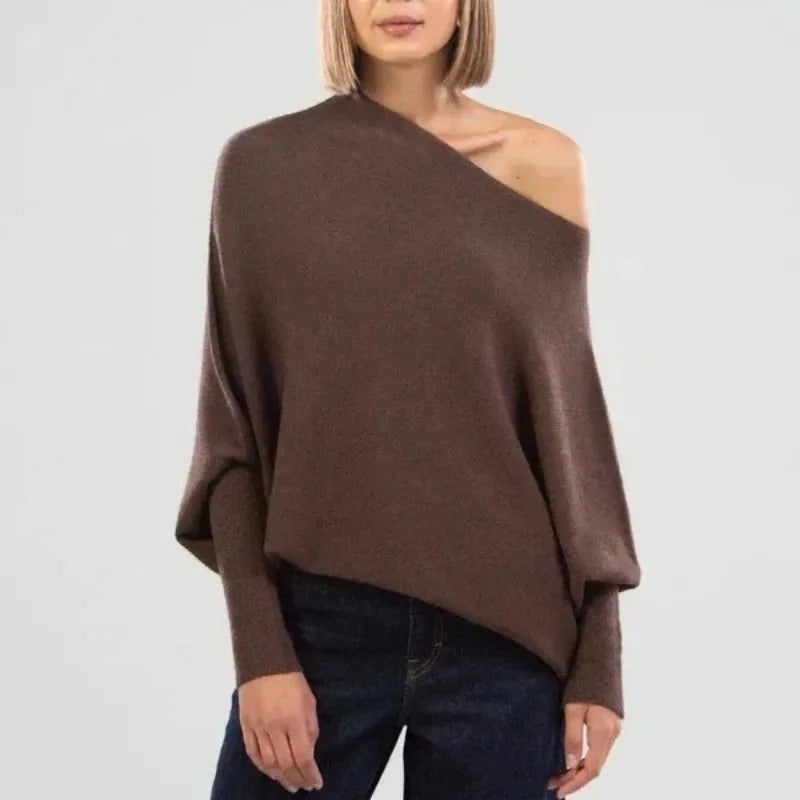 Brown asymmetric knit top worn off one shoulder