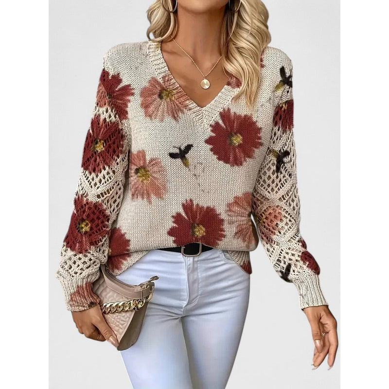 Woman in floral V-neck knit sweater with red flowers